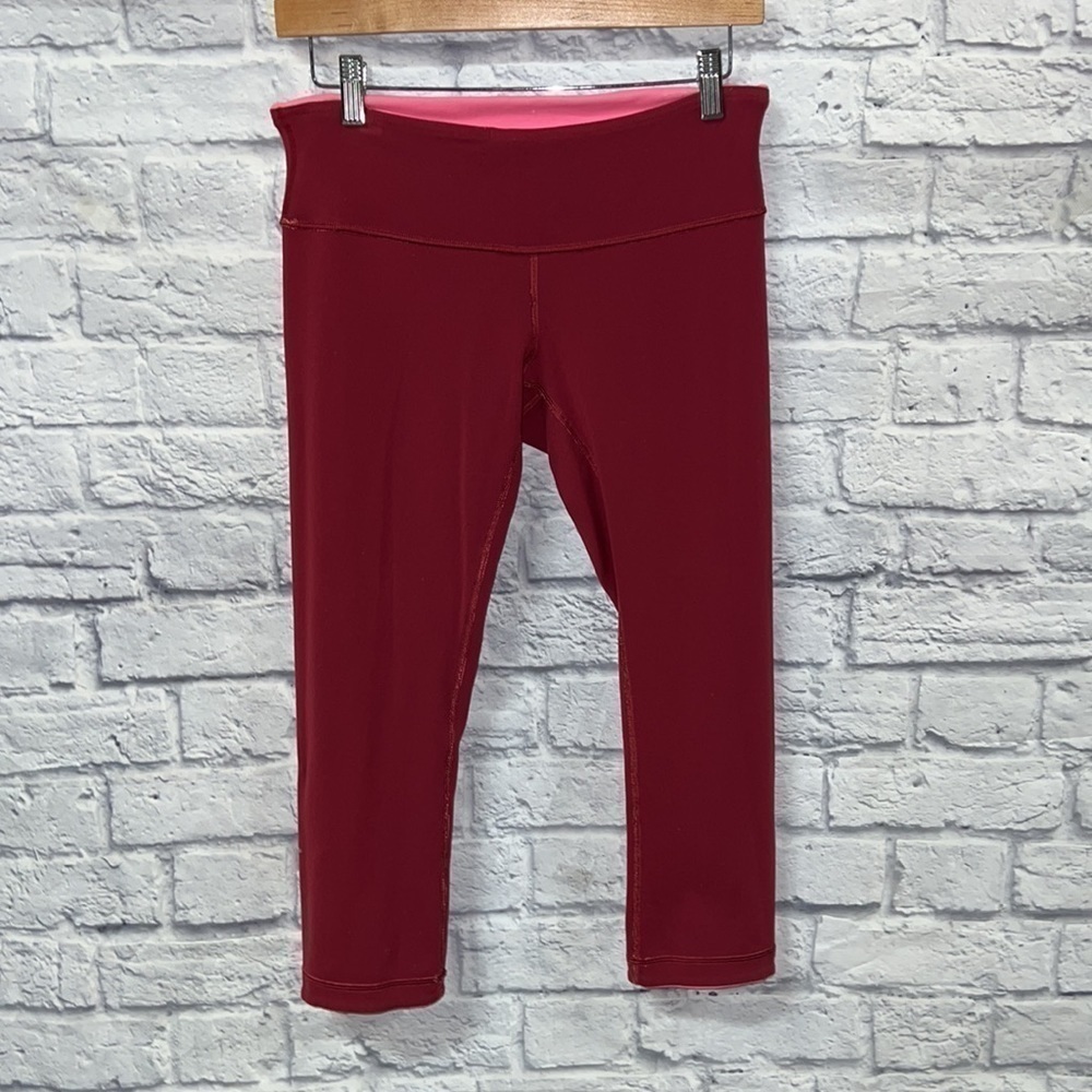 Lululemon athletica Reversible pink and maroon leggings size 8
